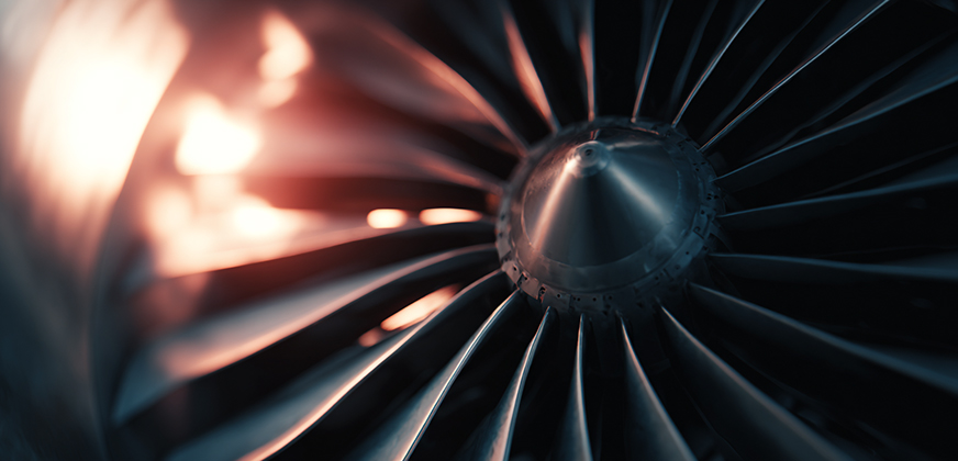 Engineers reviewing turbine blade digital twin and simulation results